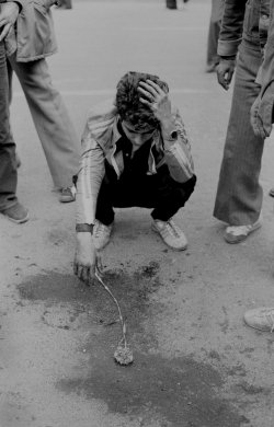 A student mourns a friend shot outside Tehran University I979 (photo Kaveh Golestan)